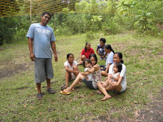 Image of people taking refuge in open area