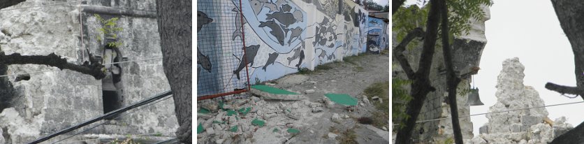 Images of damage to church and Cultural Center wall
        , Baclayon