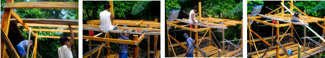 Images of construction of external kitchen in tropical
        backyard