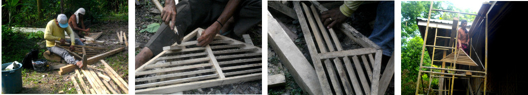 Images of men working on final details of tropical
            house roof