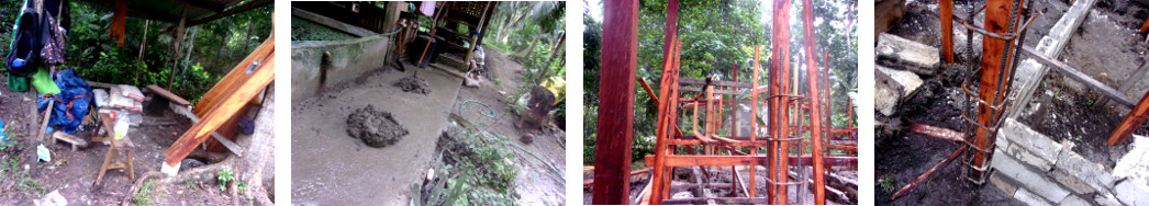 Images of men building a tropical backyard pig pen