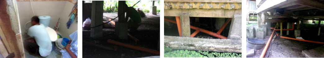 Images of plumbers at work in tropical house