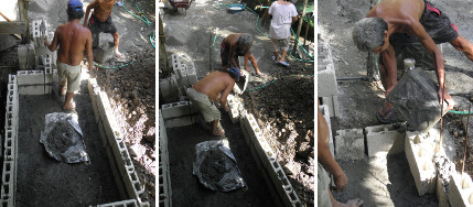 Images of wall being built by hand with hollow blocks