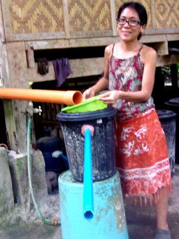 Image of a woman with a
                  grease trap