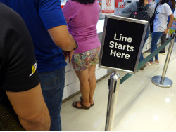 Image of a queue in a chemists shop